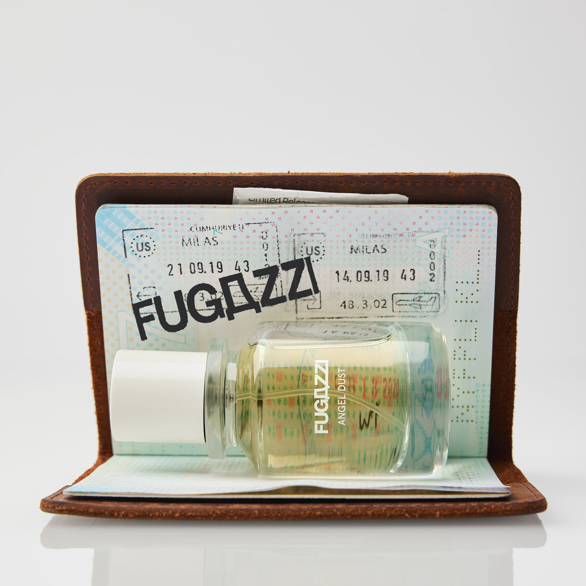 Fugazzi fragrance beside a disco ball
