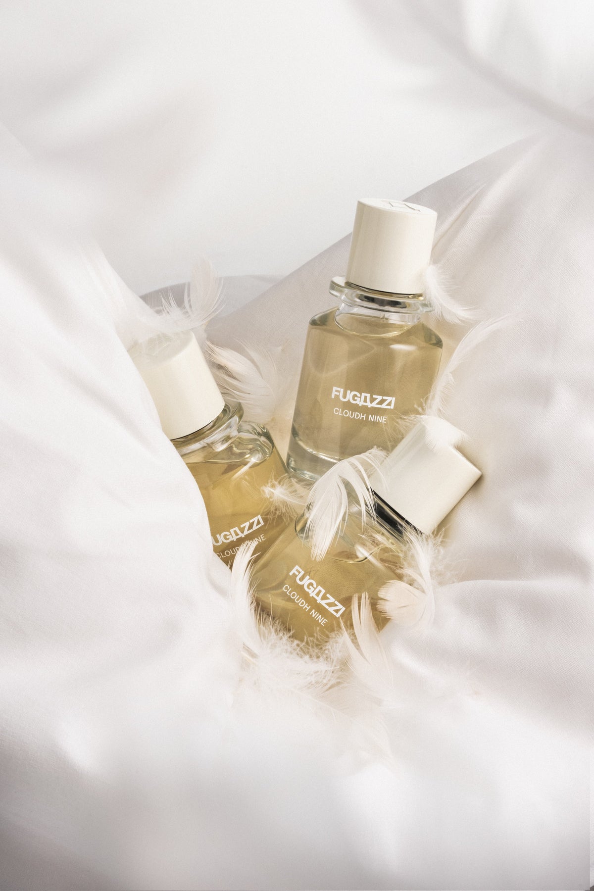 Model holding a Fugazzi fragrance